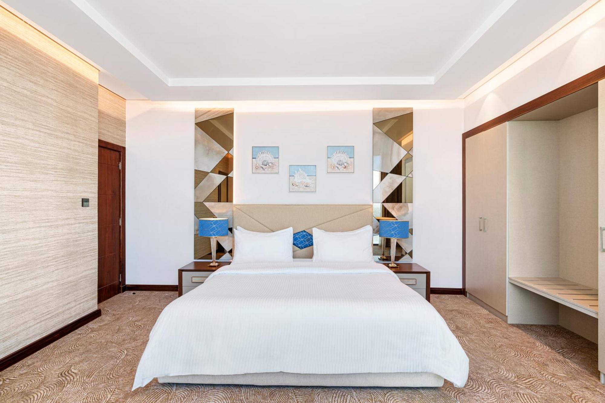 Rixos Premium Alamein 엘 알라메인 객실 사진 A bedroom at the hotel