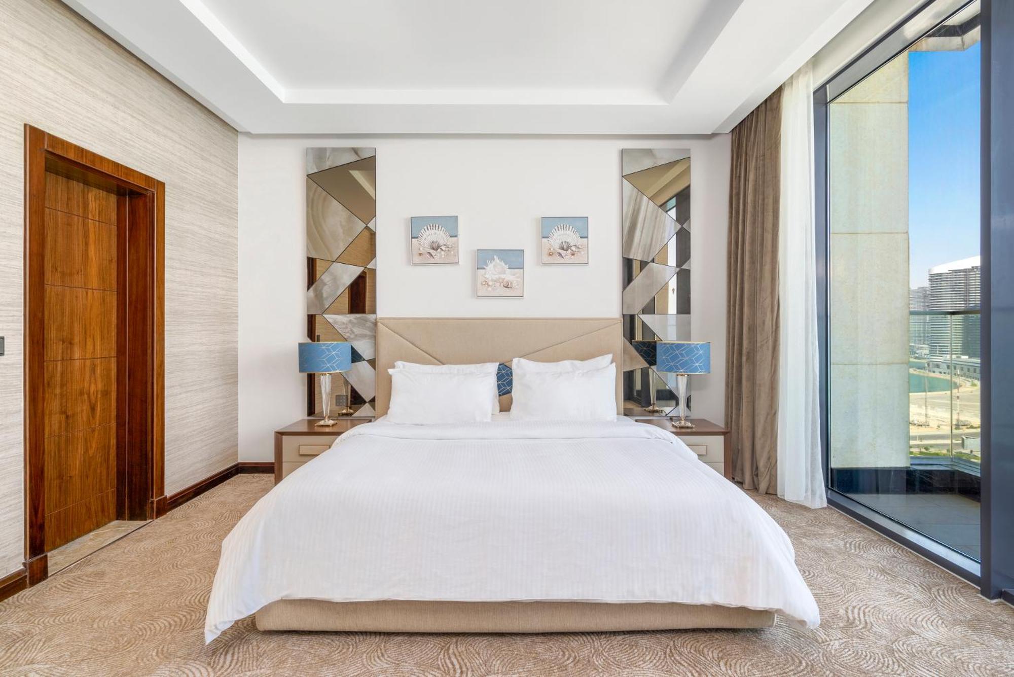 Rixos Premium Alamein 엘 알라메인 객실 사진 A bedroom at the hotel