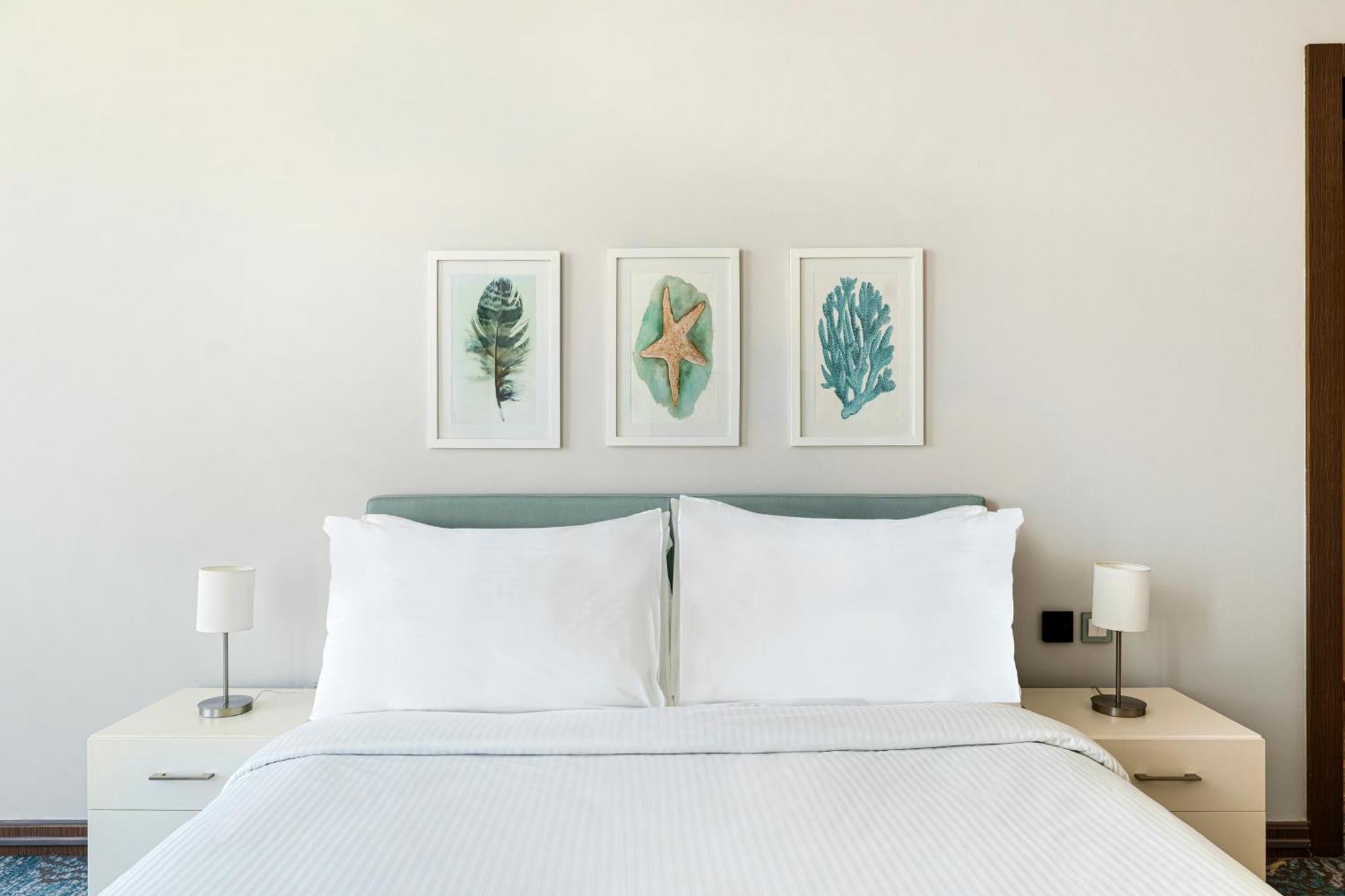 Rixos Premium Alamein 엘 알라메인 객실 사진 A bedroom at the hotel